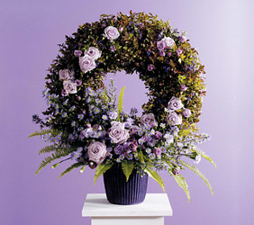 Wreath in Container with Floral Accents
