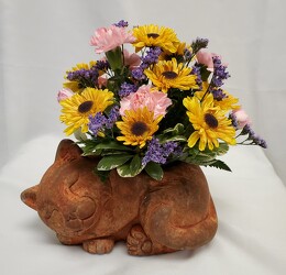 Brown Cat with Fresh Flowers