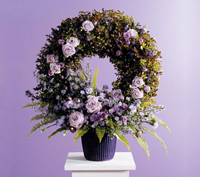 Wreath in Container with Floral Accents 